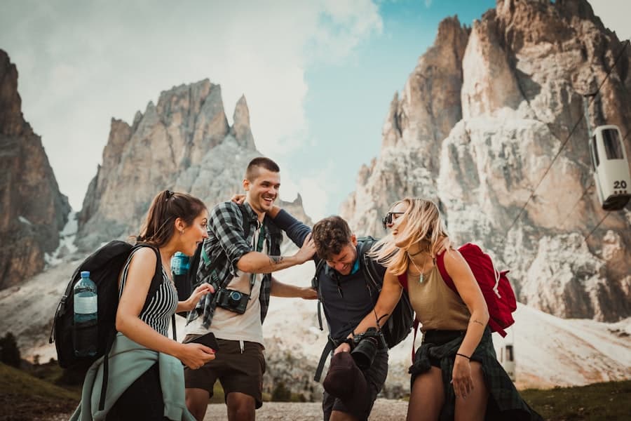 Friends looking back through photos from a shared trip